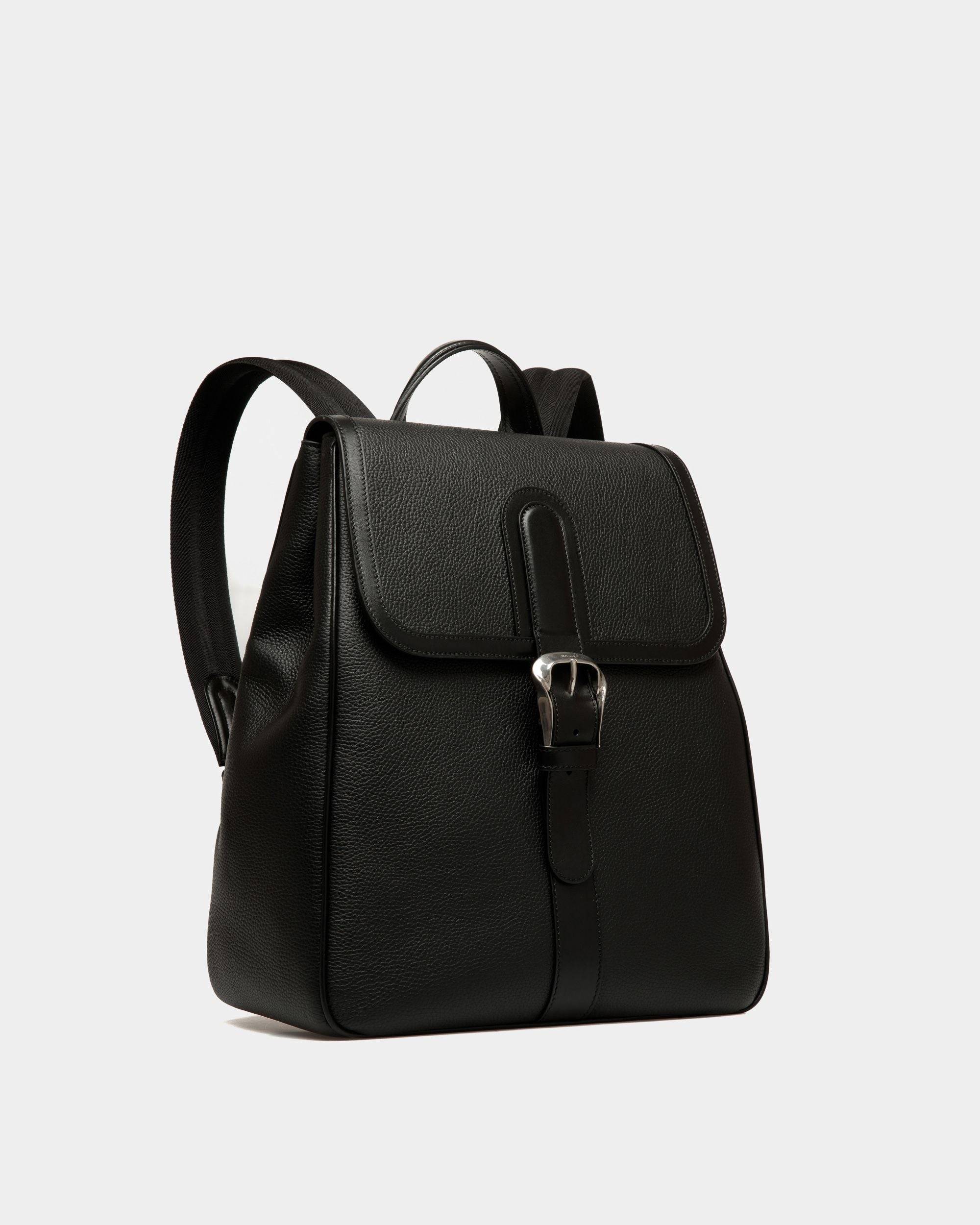 Spin | Men's Backpack in Black Grained Leather | Bally | Still Life 3/4 Front