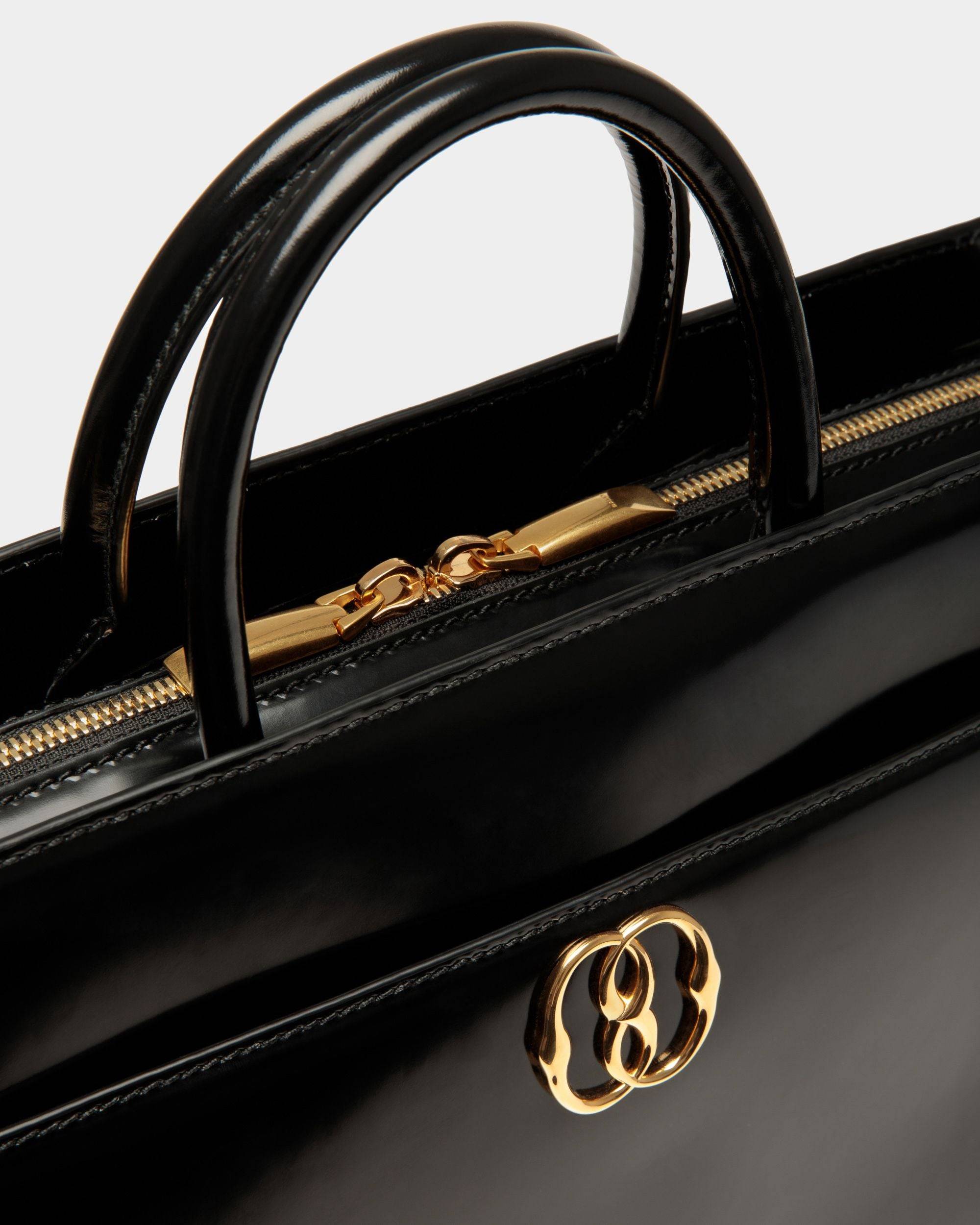 Emblem | Women's Tote Bag in Black Brushed Leather | Bally | Still Life Detail