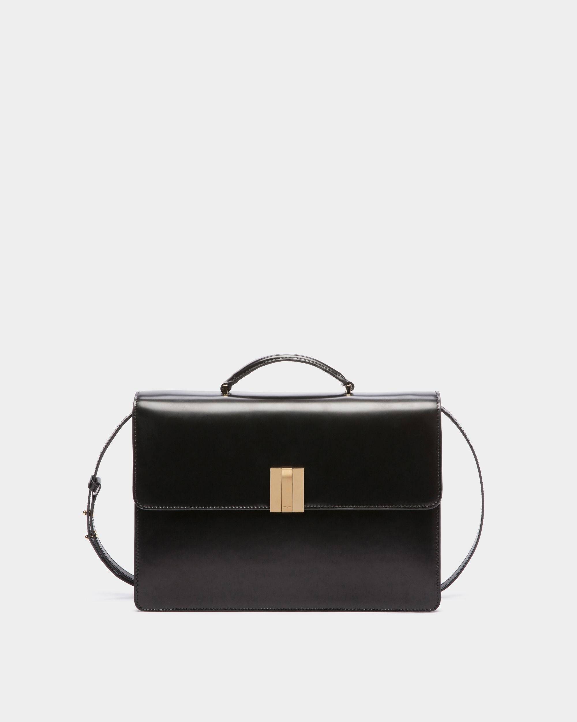 Ollam | Women's Top Handle Bag in Black Brushed Leather | Bally | Still Life Front