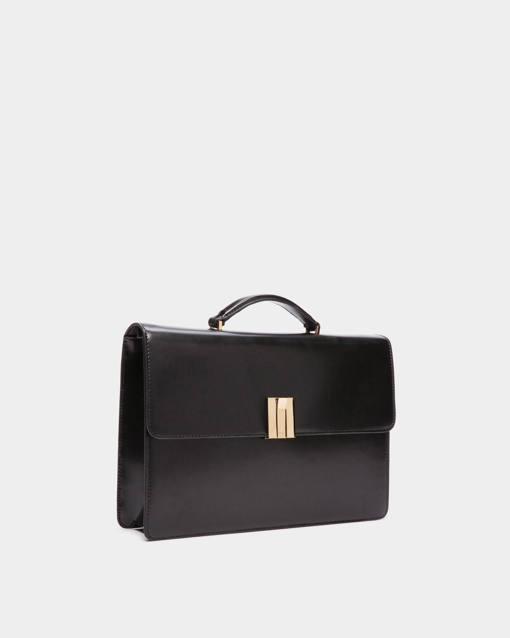 Ollam | Women's Top Handle Bag in Black Brushed Leather | Bally | Still Life 3/4 Front