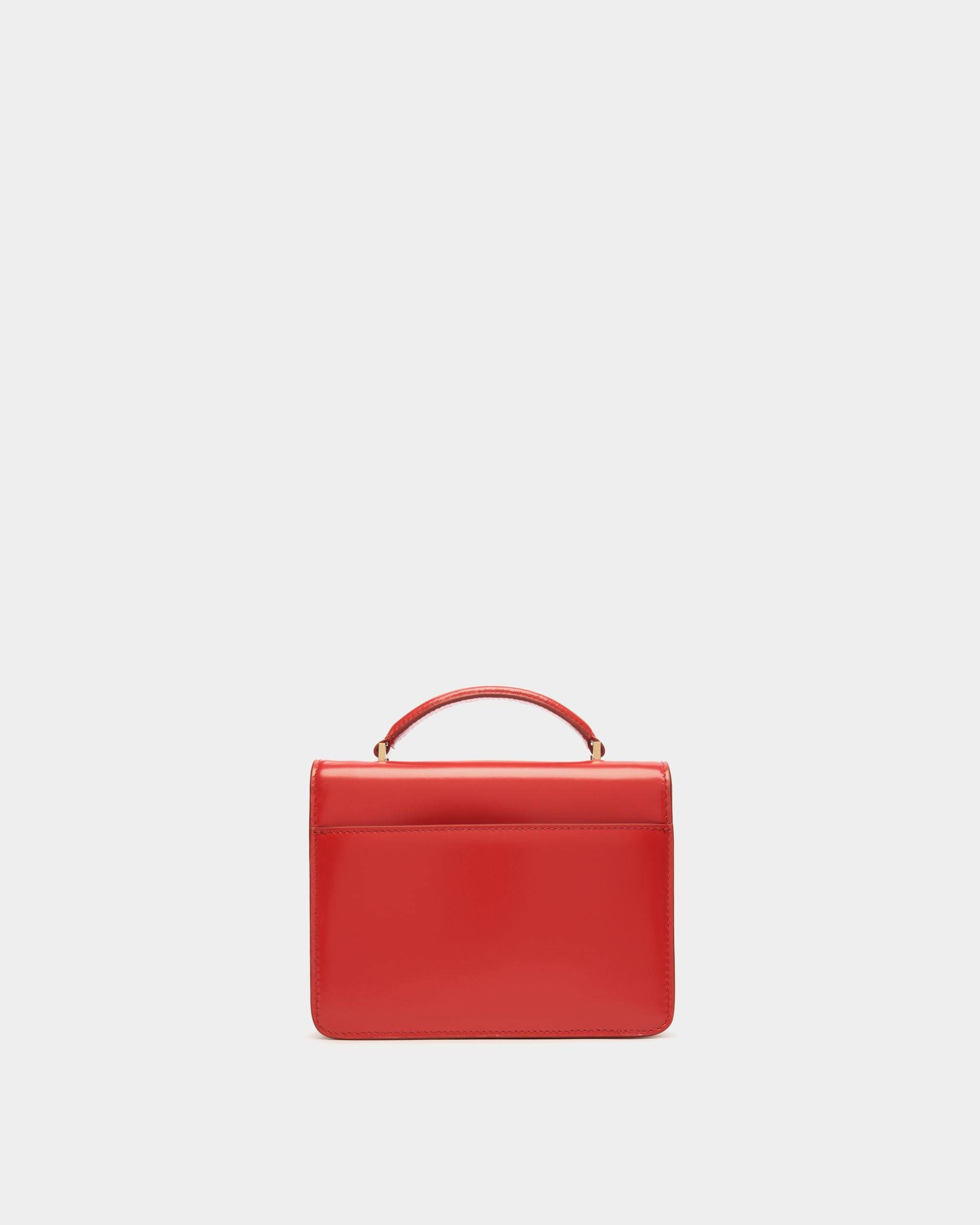 Women's Ollam Mini Top Handle Bag in Candy Red Brushed Leather | Bally | Still Life Back