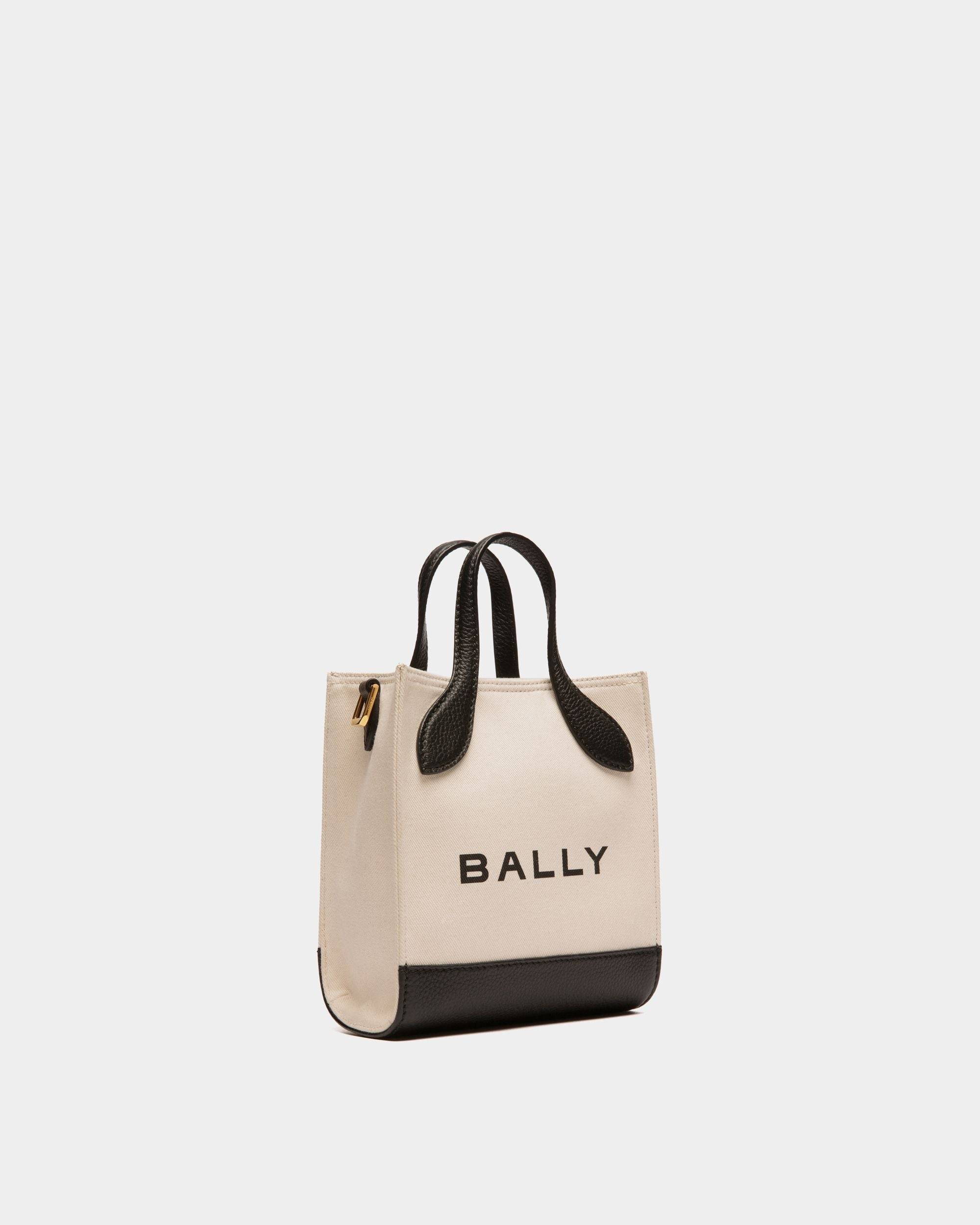 Bar | Women's Mini Tote Bag in Neutral And Black Canvas And Leather | Bally | Still Life 3/4 Front