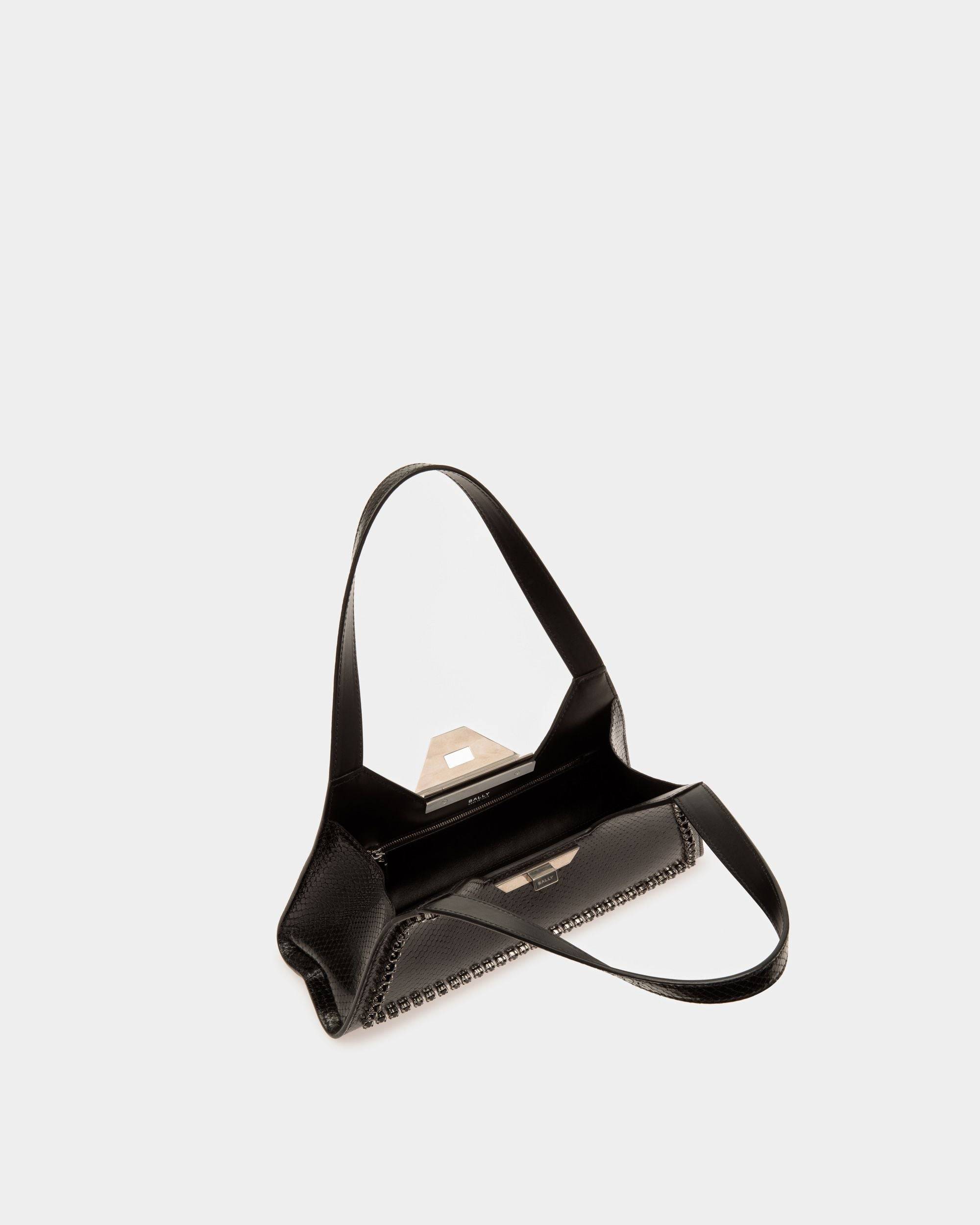 Tilt | Women's Small Shoulder Bag in Black Python Printed Leather | Bally | Still Life Open / Inside
