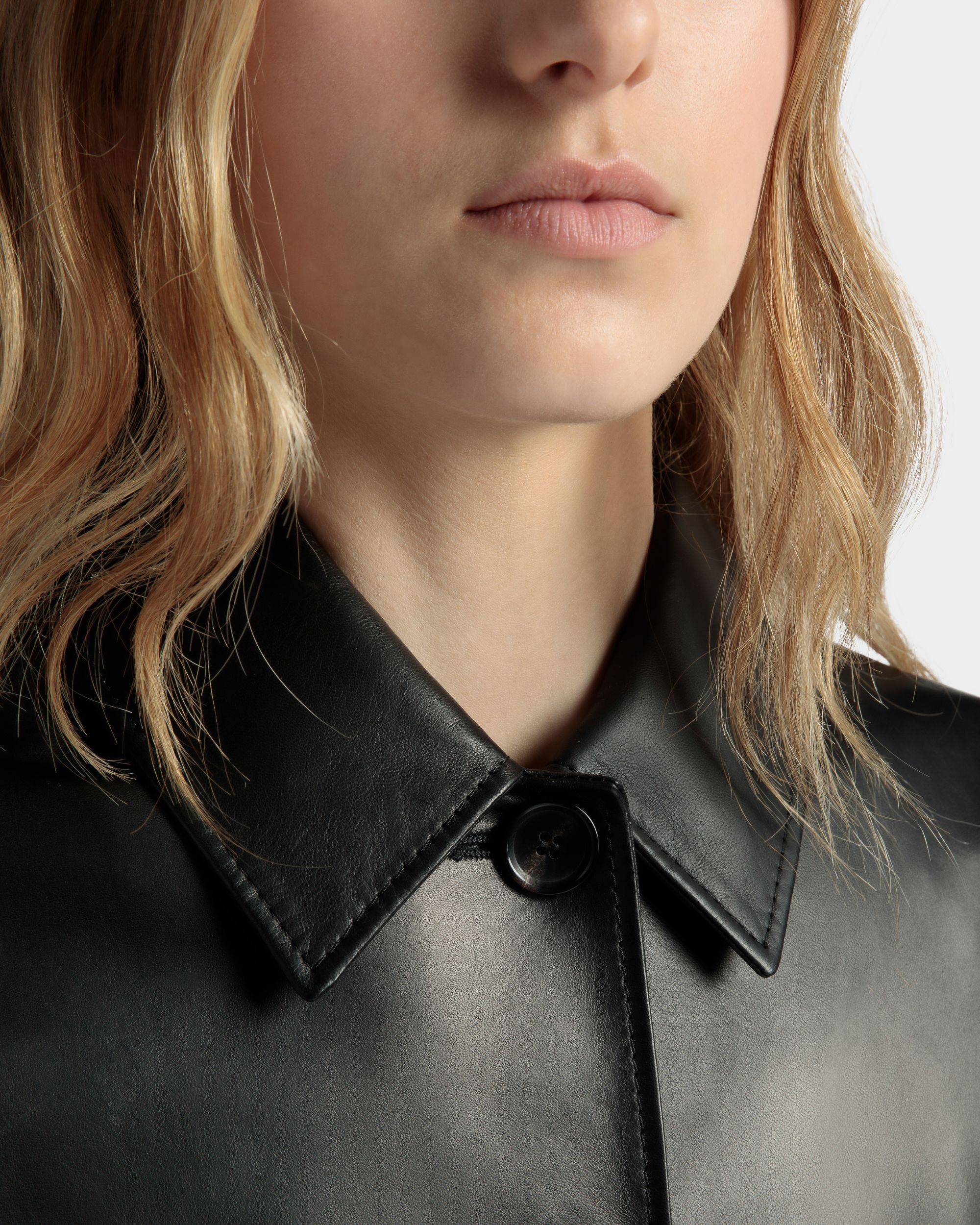 Women's Belted Midi Coat in Black Leather | Bally | On Model Detail