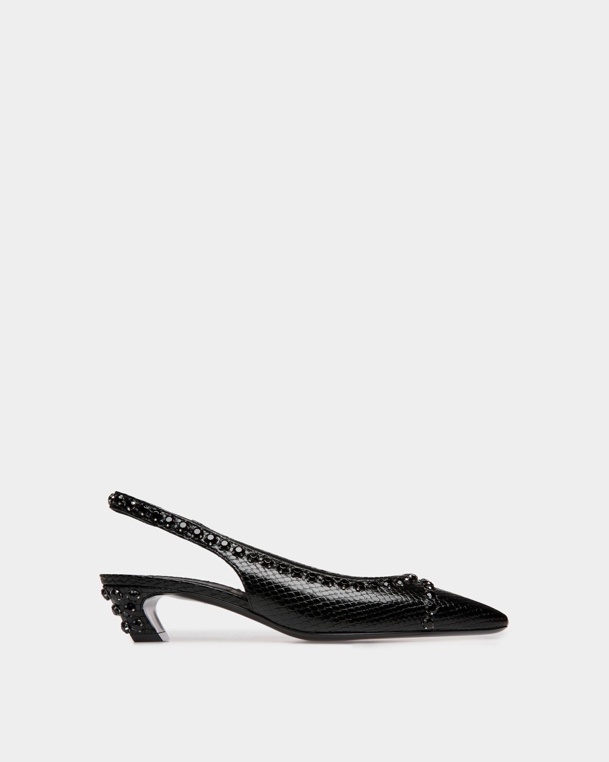 Sylt | Women's Slingback Pump in Black Python Printed Leather | Bally | Still Life Side