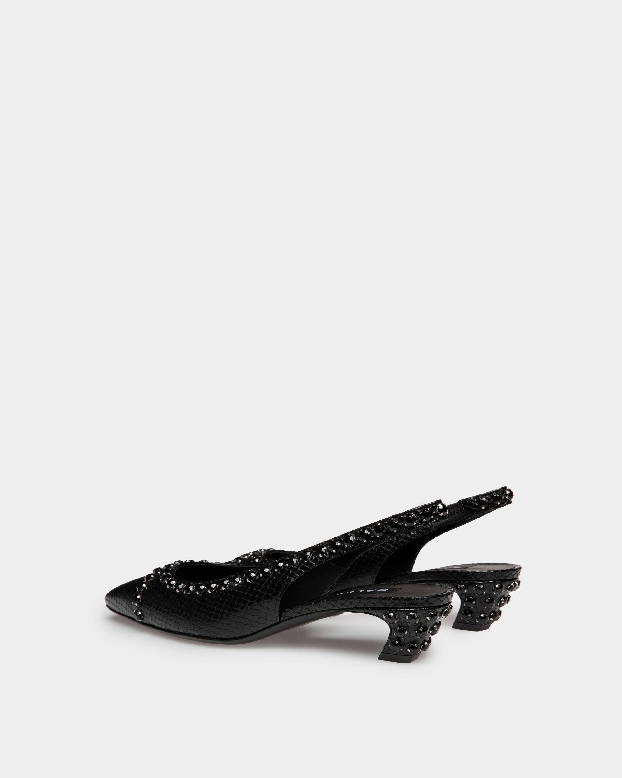 Sylt | Women's Slingback Pump in Black Python Printed Leather | Bally | Still Life 3/4 Back