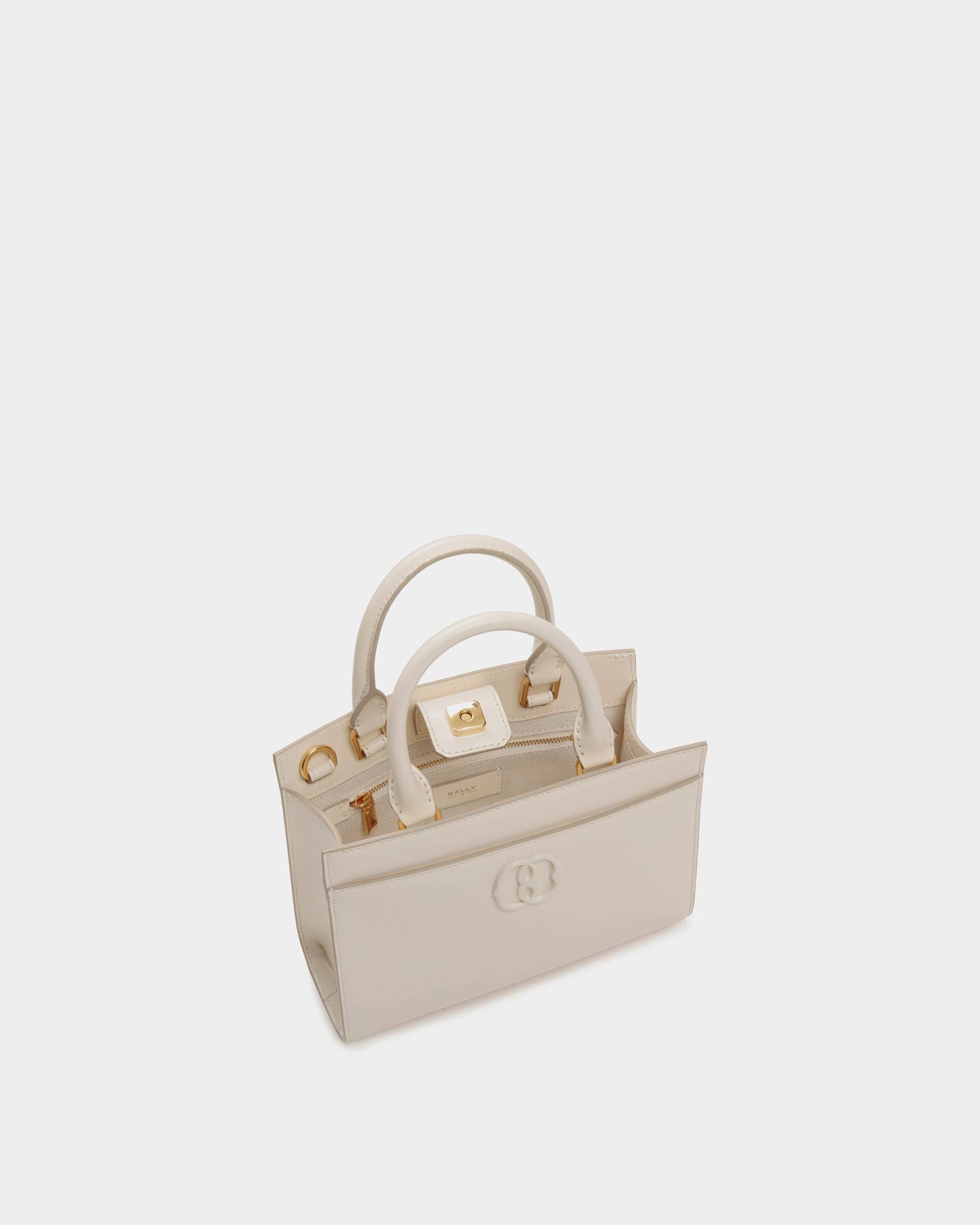Emblem | Women's Small Tote Bag in White Brushed Leather | Bally | Still Life Open / Inside