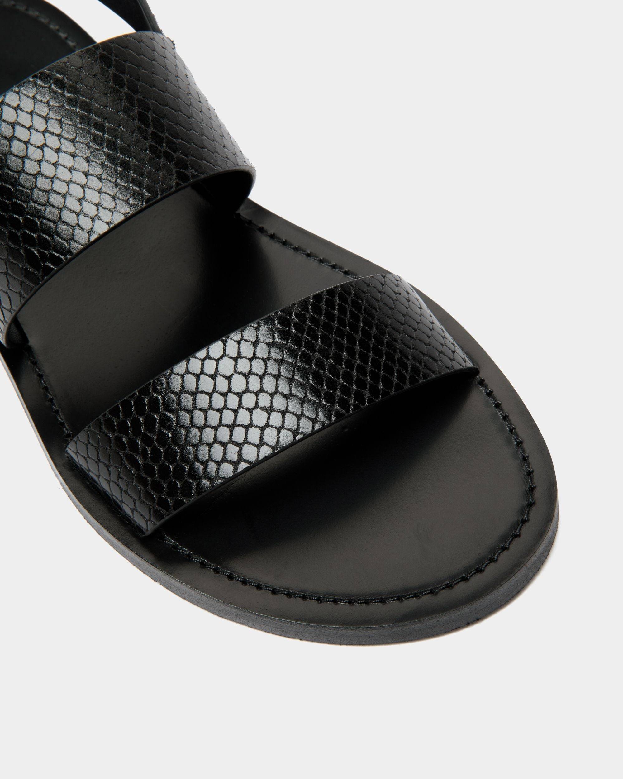Baudy | Women's Flat Sandal in Black Python Printed Leather | Bally | Still Life Detail