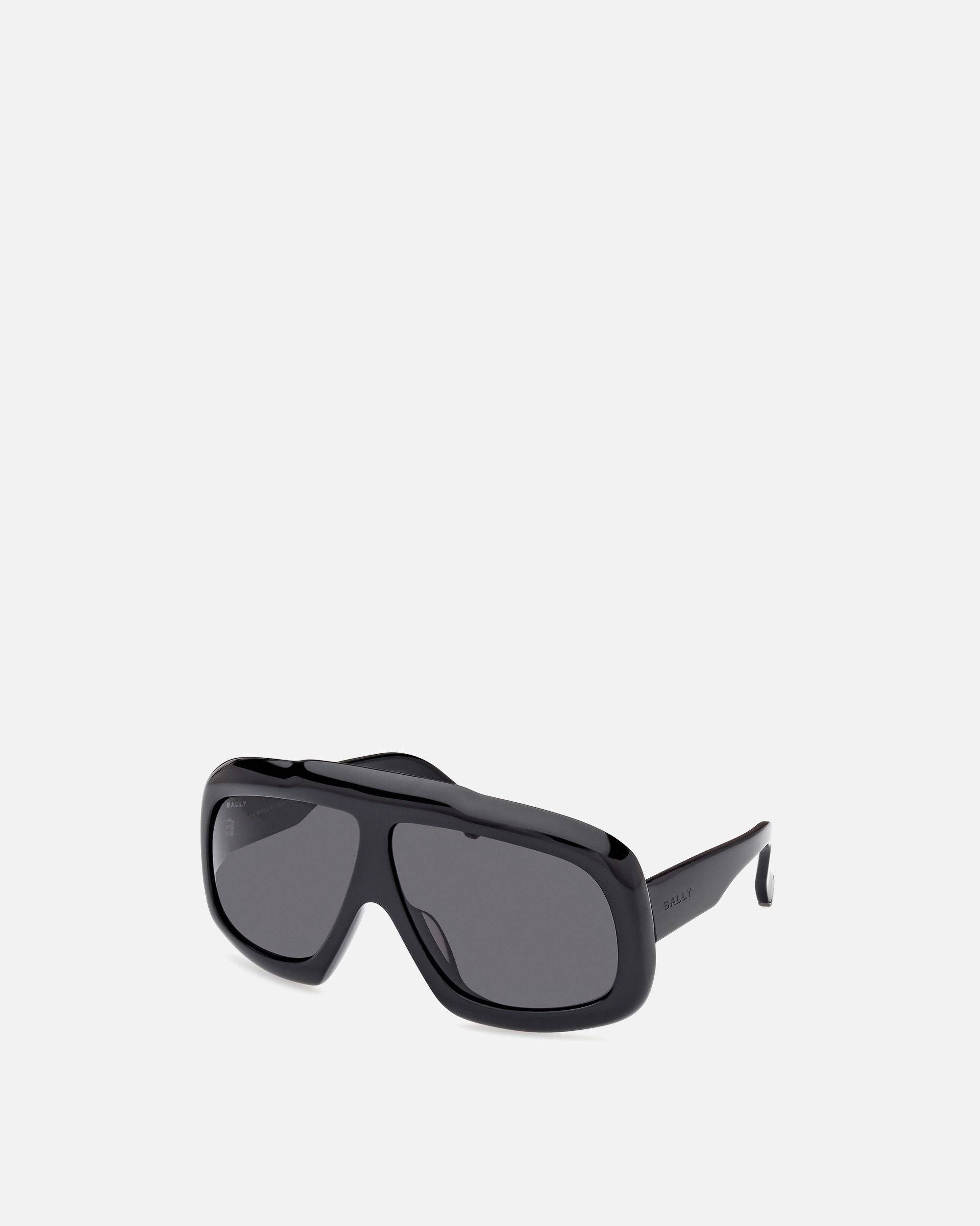 Eyger Sonnenbrille | Unisex-Accessoires | Schwarzes Acetat mit rauchgrauen Gläsern | Bally | Still Life 3/4 Seite