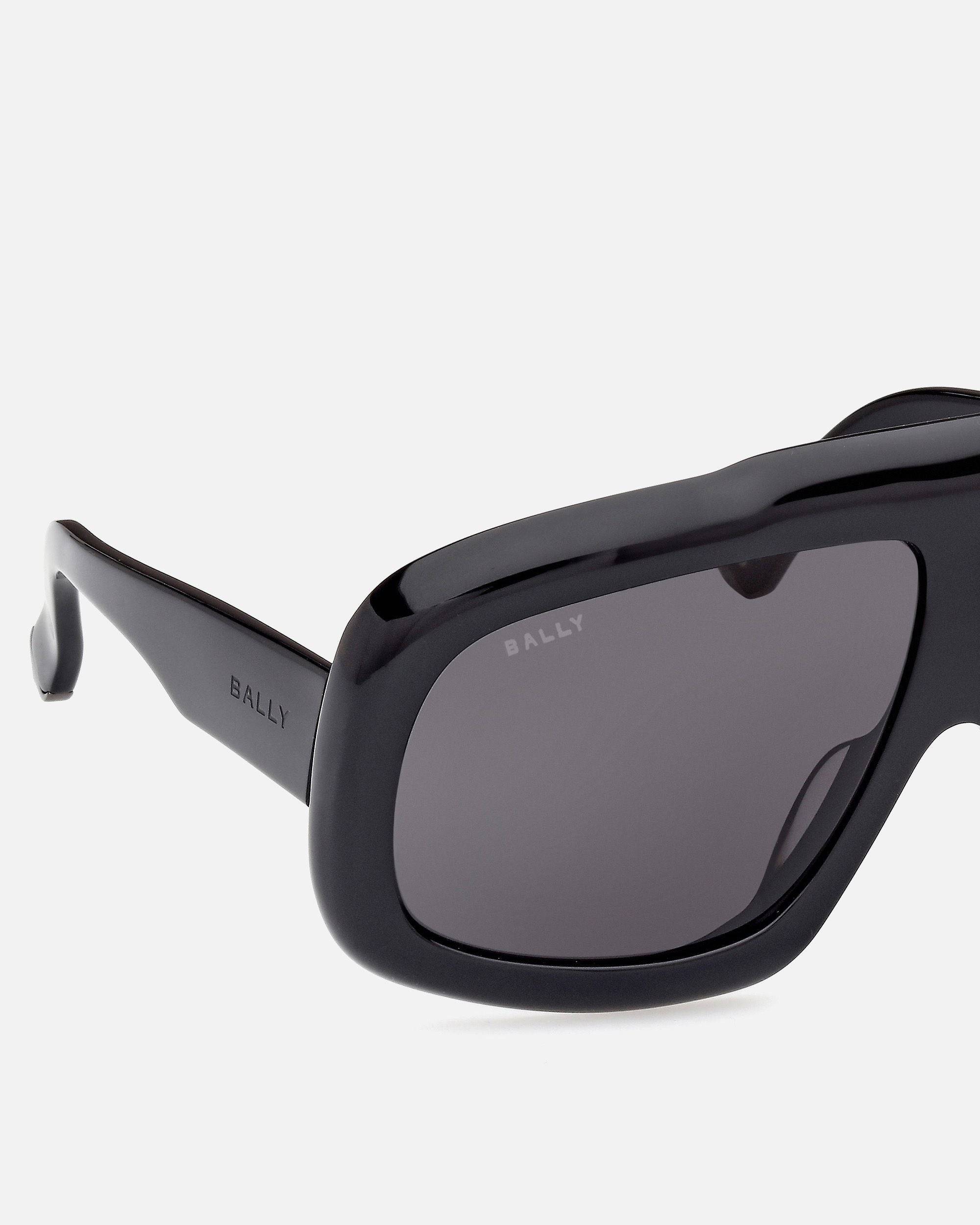 Eyger Sonnenbrille | Unisex-Accessoires | Schwarzes Acetat mit rauchgrauen Gläsern | Bally | Still Life Detail